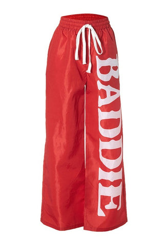 BADDIE WINDBREAKER PANTS **BLACK AND RED***